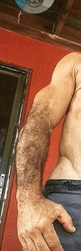 Album by DirtyDaddyFunStuff with the username @DirtyDaddyPorn, who is a verified user,  May 1, 2024 at 11:19 PM and the text says 'Hot fun #wrestling #muscles #hairy'