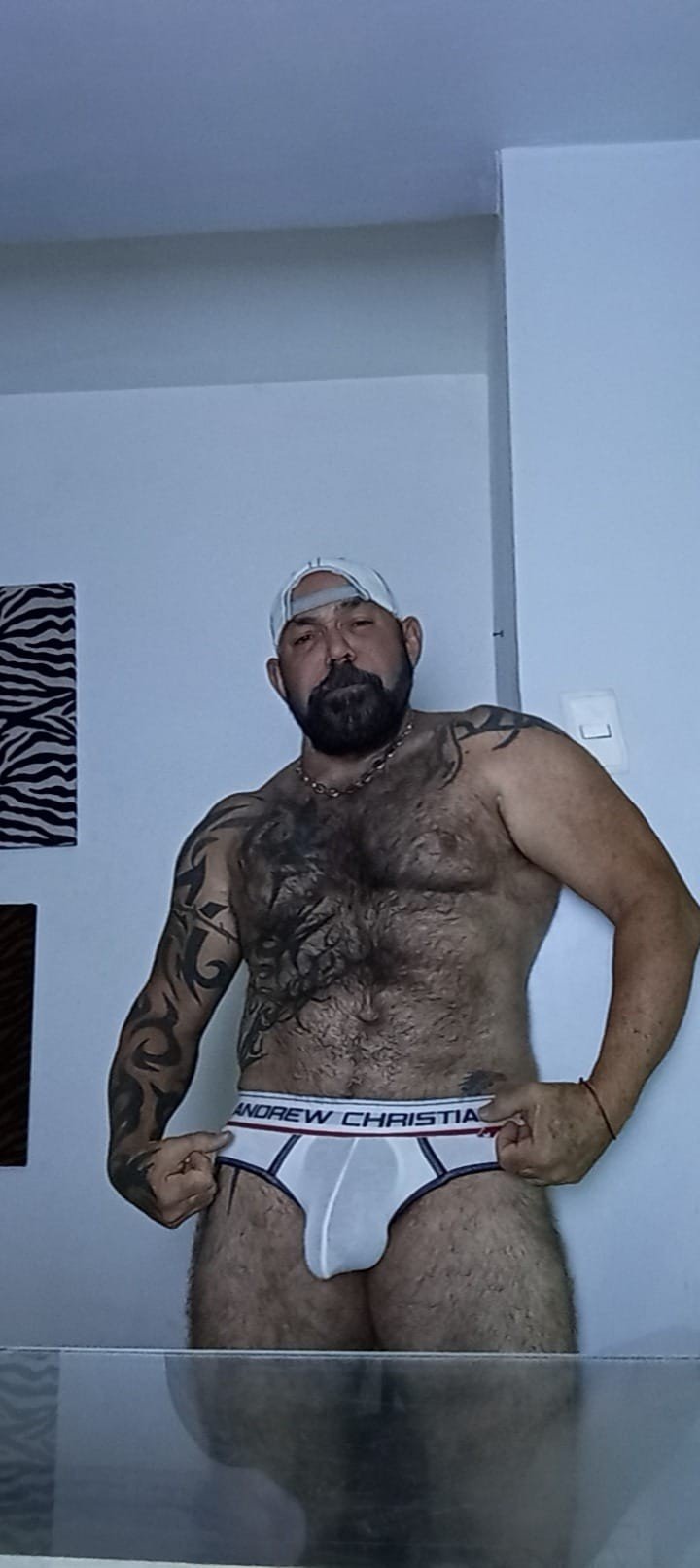 Album by DirtyDaddyFunStuff with the username @DirtyDaddyPorn, who is a verified user,  July 3, 2024 at 10:50 PM and the text says '#hairy #underwear'