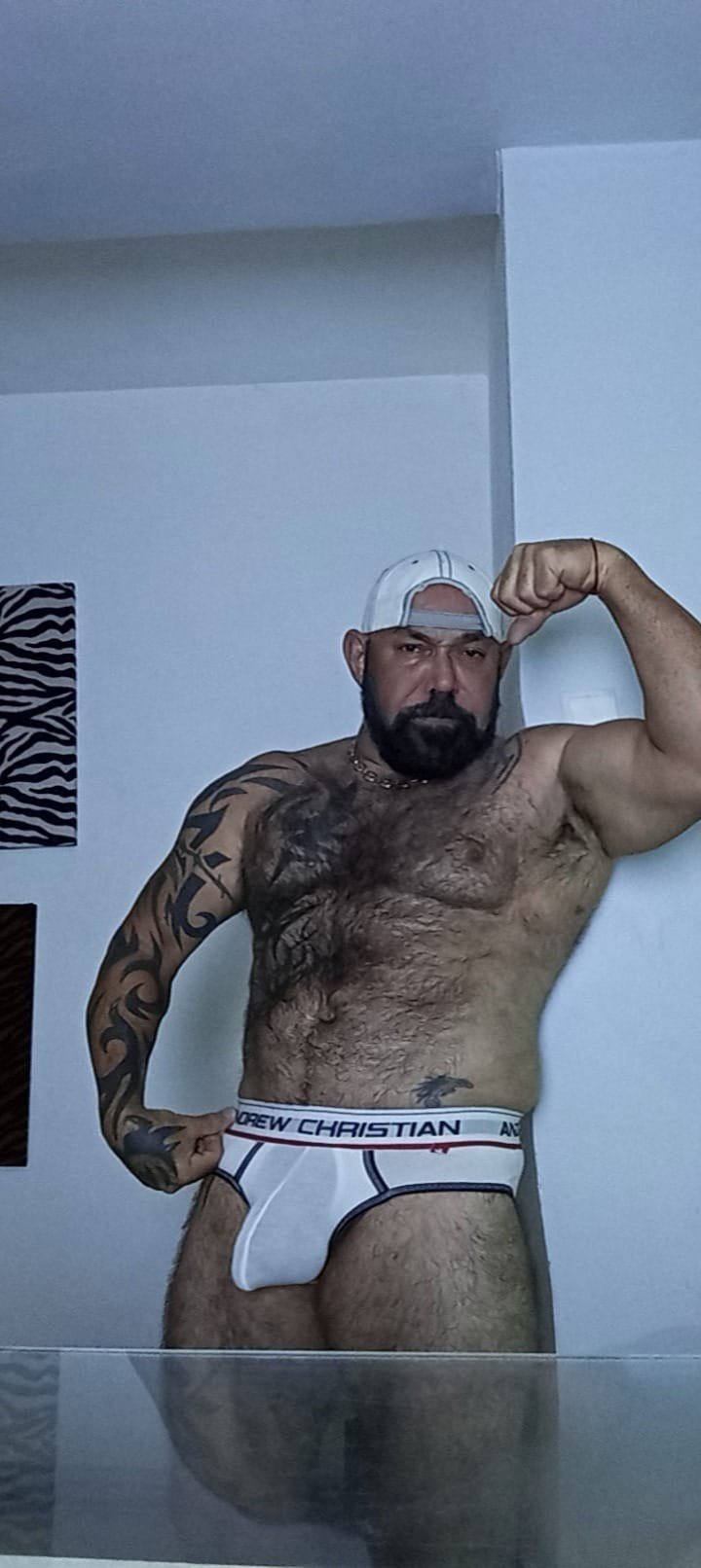 Album by DirtyDaddyFunStuff with the username @DirtyDaddyPorn, who is a verified user,  July 3, 2024 at 10:50 PM and the text says '#hairy #underwear'