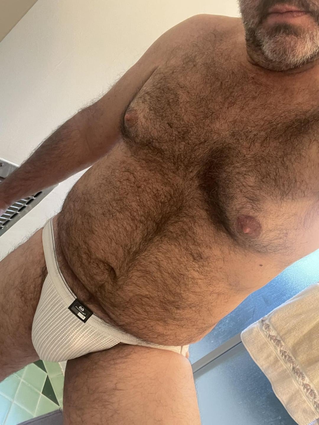 Album by DirtyDaddyFunStuff with the username @DirtyDaddyPorn, who is a verified user,  June 9, 2024 at 12:23 AM and the text says 'Hot 21 #hairy #daddies'