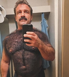 Album by DirtyDaddyFunStuff with the username @DirtyDaddyPorn, who is a verified user,  June 30, 2024 at 8:56 PM and the text says '#hairy #manly #muscles #butch #mustache #furry  #daddy'