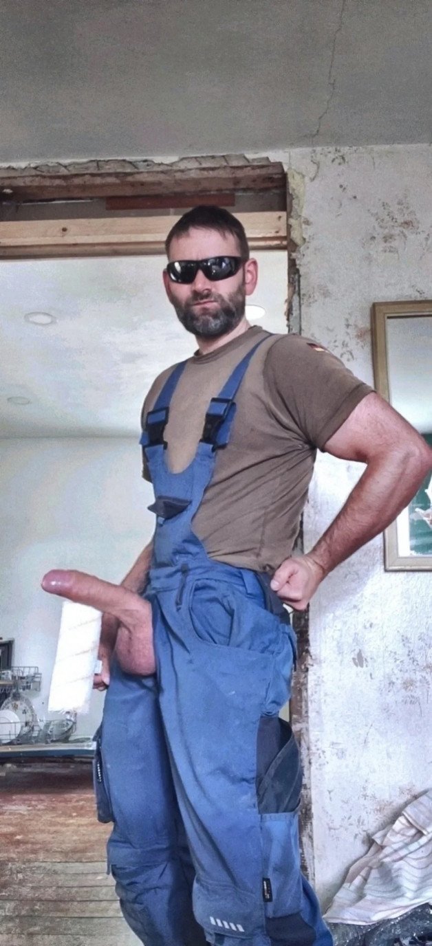 Photo by DirtyDaddyFunStuff with the username @DirtyDaddyPorn, who is a verified user,  March 28, 2024 at 6:04 PM and the text says 'Super HUNG Construction STud.  #hairy #muscles #buff #countryboys #cowboys #overalls #uniforms #denim #construction #hung #horsehung #massive #uncut #stubble #beards #farm #farmer #armpits'