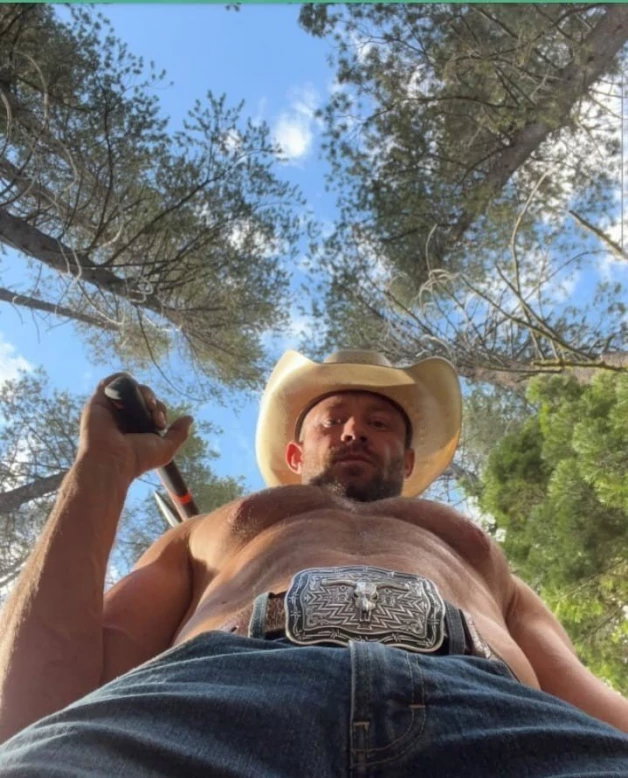 Photo by DirtyDaddyFunStuff with the username @DirtyDaddyPorn, who is a verified user,  March 28, 2024 at 5:31 PM and the text says 'The Rodeo is about to begin!  #rodeo #cowboy #countryboys #muscles #buff #hairy #stubble #beards #manly'