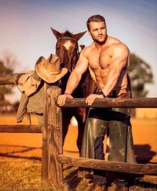 Photo by DirtyDaddyFunStuff with the username @DirtyDaddyPorn, who is a verified user,  March 28, 2024 at 5:33 PM and the text says '#rodeo Days  #cowboys #leather #manly #stubble #muscles'