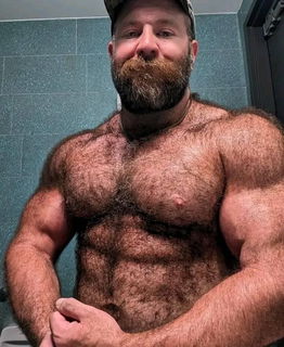 Album by DirtyDaddyFunStuff with the username @DirtyDaddyPorn, who is a verified user,  June 30, 2024 at 8:50 PM and the text says '#daddy #muscles #hairy #buff'