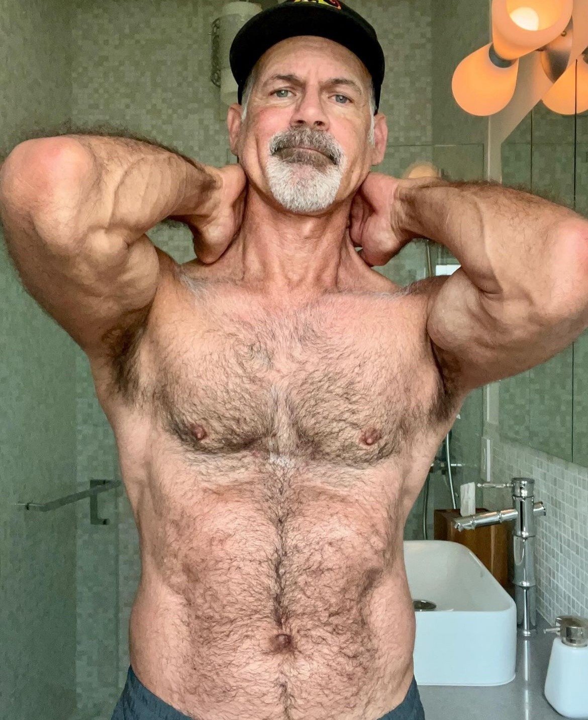 Album by DirtyDaddyFunStuff with the username @DirtyDaddyPorn, who is a verified user,  June 30, 2024 at 8:49 PM and the text says '#muscles #hairy #bears #daddy'