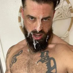 Photo by DirtyDaddyFunStuff with the username @DirtyDaddyPorn, who is a verified user,  April 7, 2024 at 9:54 PM and the text says 'King Cum !  #cum #cummybeards #beards #hairy #tats #butch #manly #facials'