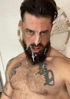 Photo by DirtyDaddyFunStuff with the username @DirtyDaddyPorn, who is a verified user,  April 7, 2024 at 9:54 PM and the text says 'King Cum !  #cum #cummybeards #beards #hairy #tats #butch #manly #facials'