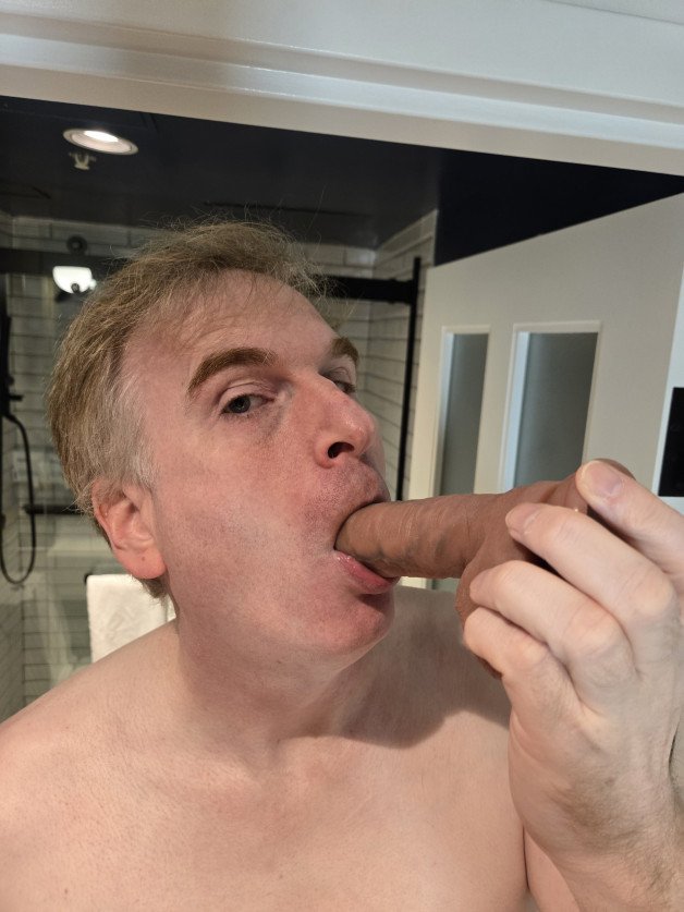 Photo by Justin Smith with the username @JustinLSmith, who is a verified user,  November 5, 2024 at 6:52 PM and the text says 'Sucking a dildo.
#gay #dildo #submissive'