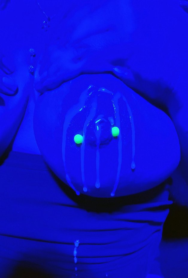 Photo by Kenley & Erik with the username @KenleyandErik, who is a verified user,  August 6, 2024 at 12:00 PM and the text says 'Fun Fact!

Erik's load of cum on my tits doesn't glow in blacklight'