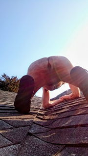 Photo by NakedBiguy with the username @NakedBiguy, who is a verified user,  August 9, 2024 at 5:06 PM. The post is about the topic Gay Exhibitionists and the text says 'Up on the roof of the house'