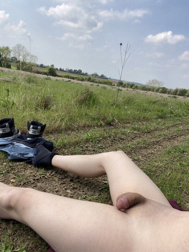 Album by Lockmeup with the username @Lockmeup, who is a verified user,  May 11, 2024 at 12:49 PM and the text says 'First really nice day here in the UK and i couldnt resist a wander and a little naked sunbathing. Not even 5 minutes walk outside of town but it’s deserted. Gotta love just how much nudity you can actually get away with outdoors. #exhibitionist..'