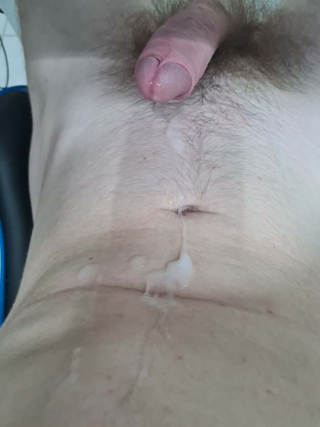 Photo by Unicorn69X with the username @Unicorn69X, who is a verified user,  January 28, 2024 at 1:35 AM. The post is about the topic Cum Freaks and the text says 'Just some cum on my belly. ;)'