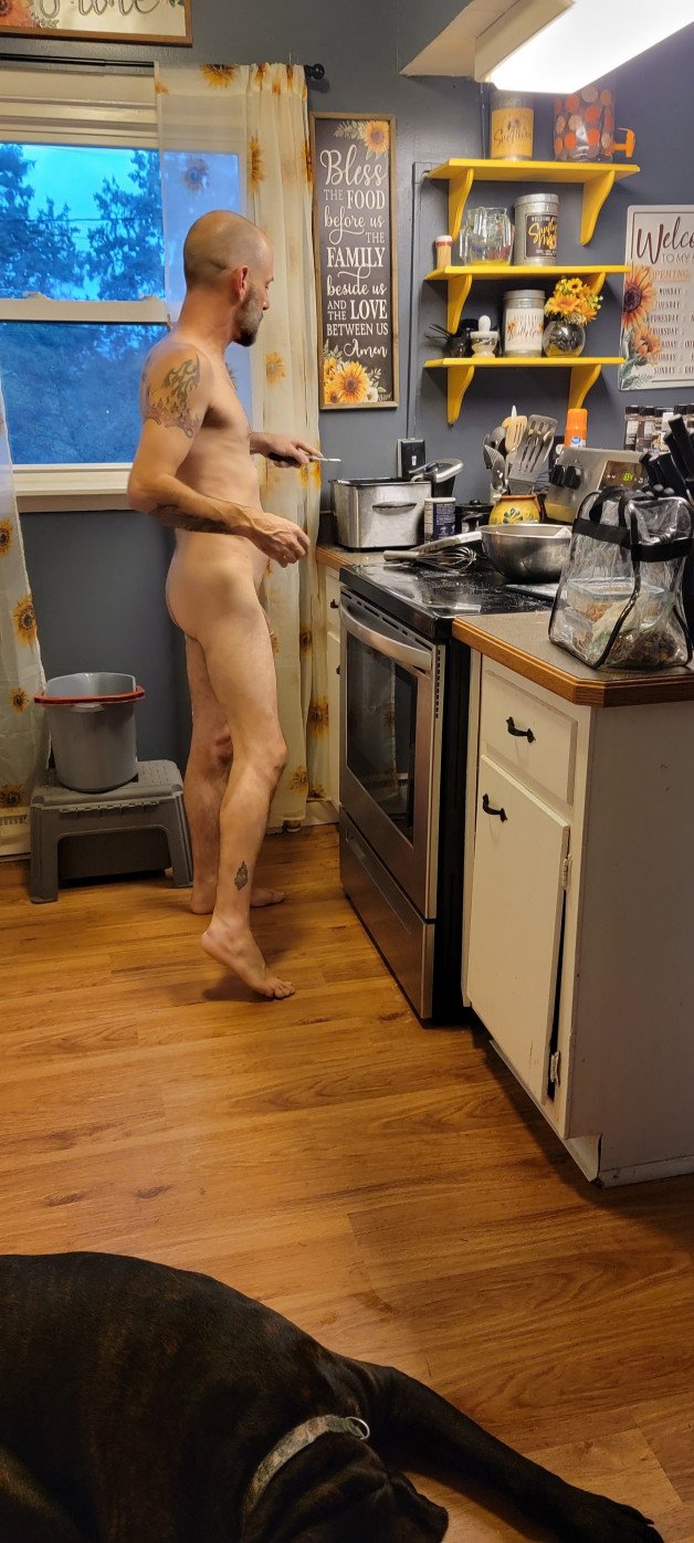 Album by BothWaysEntwined with the username @BothWaysEntwined, who is a verified user,  April 30, 2024 at 8:35 PM and the text says 'when he cooks naked 😋 😍   #amateur #hothusband #cooking #nude #nakedcook #naked #bigcock'