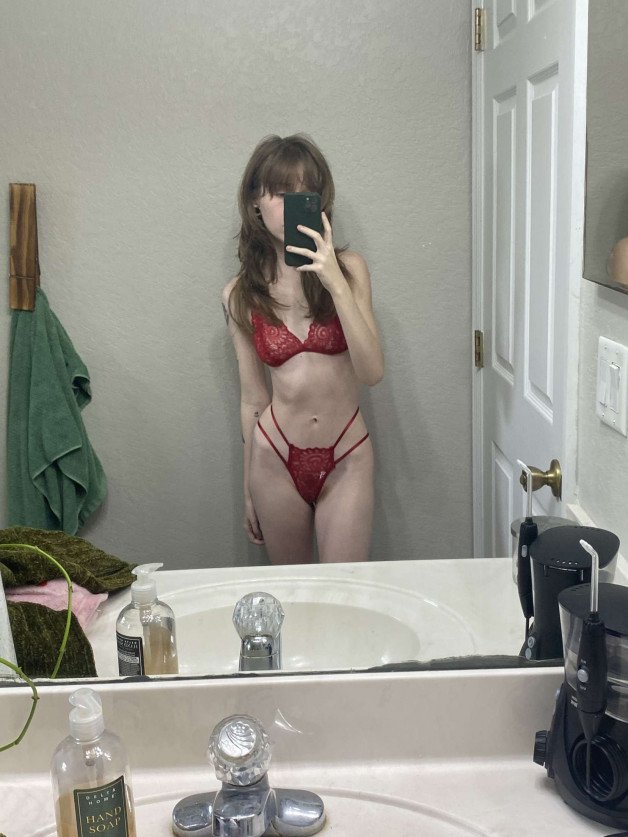 Photo by Bella with the username @teensybella, who is a star user,  February 8, 2024 at 1:39 PM. The post is about the topic Mirror Selfies and the text says 'how do i look in red?'