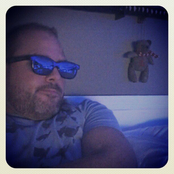 Photo by Nutterbutter with the username @NuttsNButts,  December 31, 2012 at 4:21 AM and the text says '#teddy#bear#swords#3D#sun#glasses that&rsquo;s how we watch #StarWars'