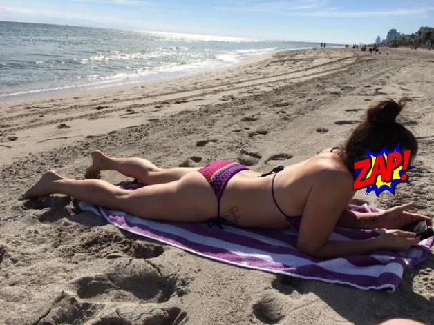 Photo by HotnReadyOnes with the username @HotnReadyOnes, who is a verified user,  April 5, 2024 at 9:10 PM. The post is about the topic Sunbathing and the text says 'Mrs. Hot soaking up the sun! #mrsHot'