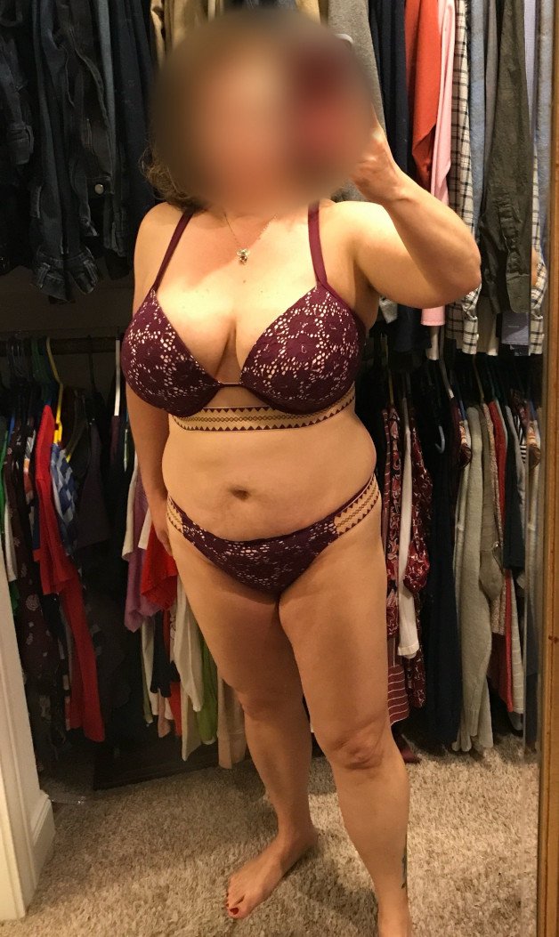 Photo by Foxywifey1975 with the username @Foxywifey1975, who is a verified user,  July 6, 2024 at 3:18 PM and the text says 'Heading down to the beach today. Think everyone will like my bikini?'