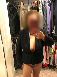 Album by Foxywifey1975 with the username @Foxywifey1975, who is a verified user,  September 17, 2024 at 2:10 AM and the text says 'Picking out my outfit for tomorrow. Would you guys approve if I showed up in this outfit?'