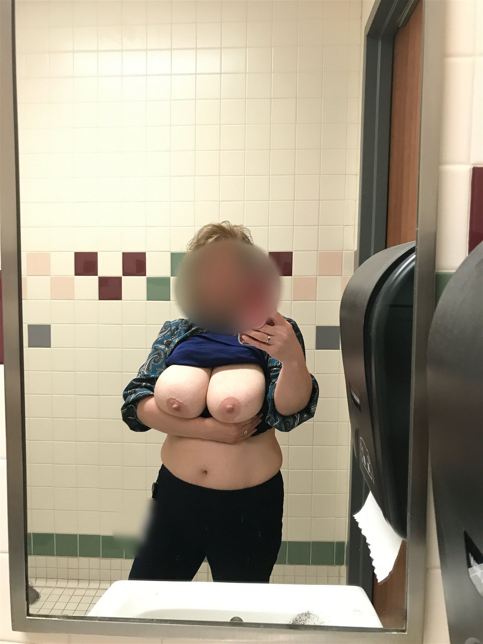 Photo by Foxywifey1975 with the username @Foxywifey1975, who is a verified user,  April 16, 2024 at 3:04 PM and the text says 'Happy Titty Tuesday! Sneaking some pics for you from work while on a quick break. Hope you like'