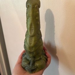 Photo by coffeecalico with the username @coffeecalico, who is a verified user,  April 27, 2024 at 12:55 AM and the text says 'In honor of it being Alien day (4-26) I want to show off my favorite toy. Its the 6" Ridley from Bad Dragon. (Custom color I think.) I've had it for 6 years and love it so much tbh'