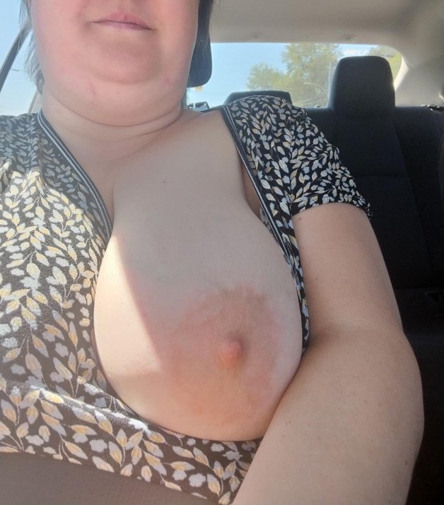 Photo by Humiliation Pig Slut with the username @HumiliationPigslut, who is a verified user,  August 26, 2024 at 7:42 PM and the text says 'Taking my tit out in the car.
#bbw #boobs #flashingtits #flashing #fat'