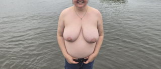 Photo by Humiliation Pig Slut with the username @HumiliationPigslut, who is a verified user,  November 8, 2024 at 4:07 AM and the text says 'Topless at the beach

#BBW #topless #bigtits'