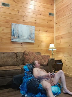 Photo by TheJTLovecraft with the username @TheJTLovecraft, who is a verified user,  August 11, 2024 at 10:20 PM and the text says 'On a getaway. Cozy cabin in the Foothills. #dadbod #cock #tattoos'