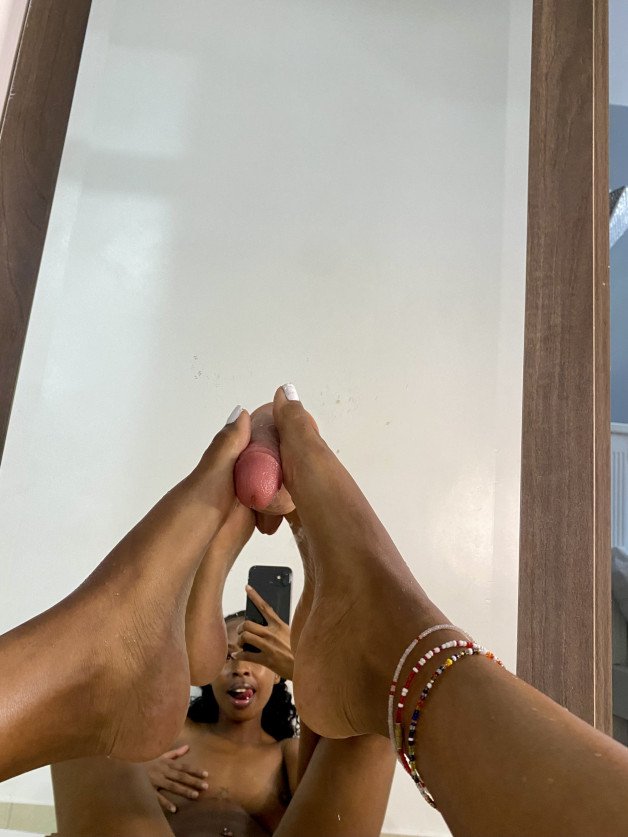 Photo by Petite Ebony Naomi with the username @naomiebony, who is a star user,  August 7, 2024 at 6:54 AM. The post is about the topic footjob and the text says 'i am a pro with my feets as well'