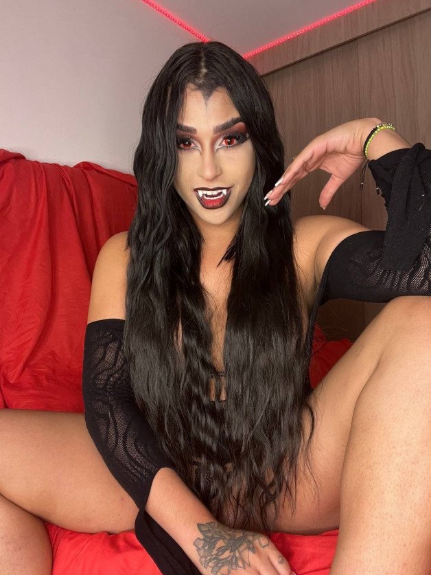 Photo by Cassie - Alpha Queen ❣️ with the username @alphaboner, who is a star user,  October 31, 2024 at 5:35 PM. The post is about the topic Transsexual and the text says 'Money or life?😈 Lol, are you ready for Halloween, ?🎃🔥
#trans #transwomen'