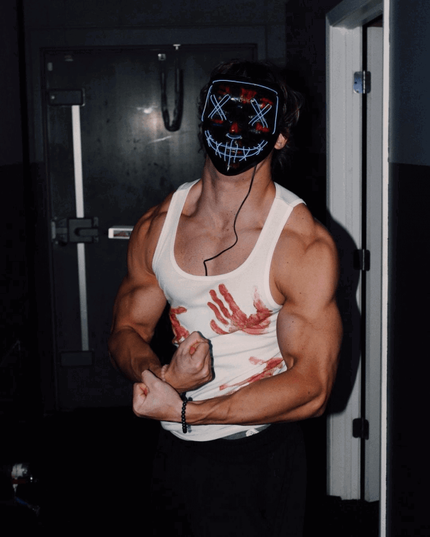 Photo by localconjureman with the username @localconjureman, who is a verified user,  July 5, 2024 at 4:53 PM and the text says 'Hot, muscular, and masked the perfect combination'