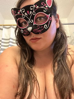 Photo by valroxy99 with the username @valroxy99, who is a verified user,  July 8, 2024 at 5:48 PM and the text says 'this kitty is prowling and ready to roar! ;) #kitty #mask #sexy'