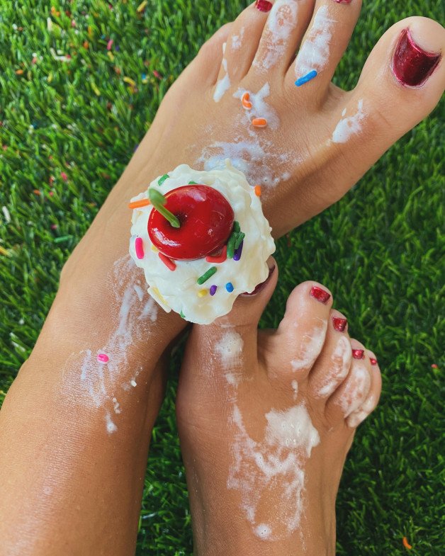 Photo by MadsMunro with the username @MadsMunro, who is a verified user,  September 18, 2024 at 5:17 PM. The post is about the topic Sexy Feet and the text says 'a cherry on top for you!

If you desire more of me, follow me here 
👉🏻 https://fans.ly/r/madysonmunro 

#feet #footfetish #footworship #toes #redtoes #whippedcream'