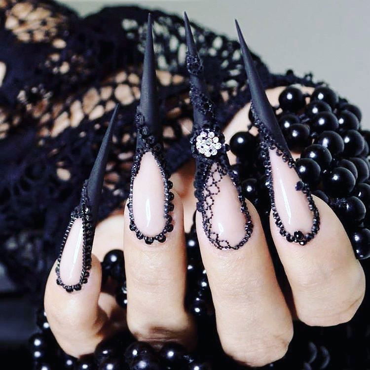 Photo by SykaLive with the username @SykaLive, who is a verified user,  October 31, 2016 at 8:32 PM and the text says 'rogueandwolf:
Aren’t these #claws the best thing you’ve seen all day? ! ❤ Perfect for #halloween too! ♥ via Instagram http://ift.tt/2f5opoO'