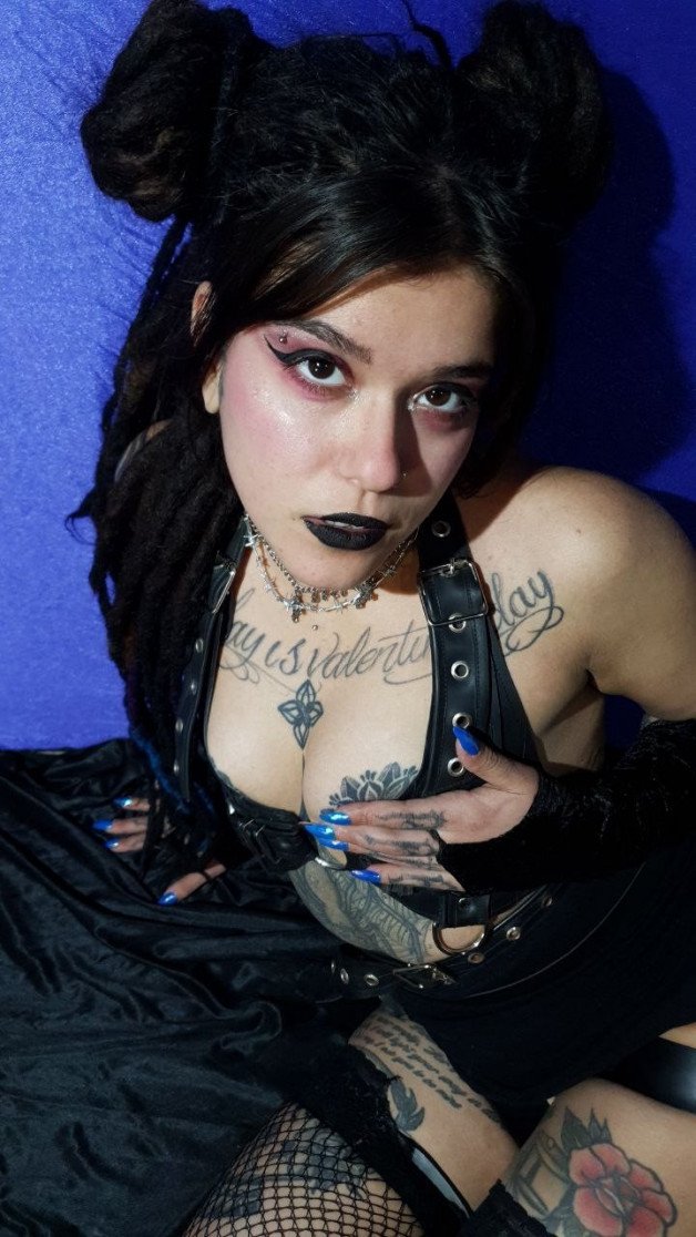 Photo by Jynx Gothic Doll with the username @femdomjynx, who is a star user,  September 10, 2024 at 3:55 PM. The post is about the topic Goth Girls and the text says 'The Lord of Hell has sent me to you⛓️🖤'