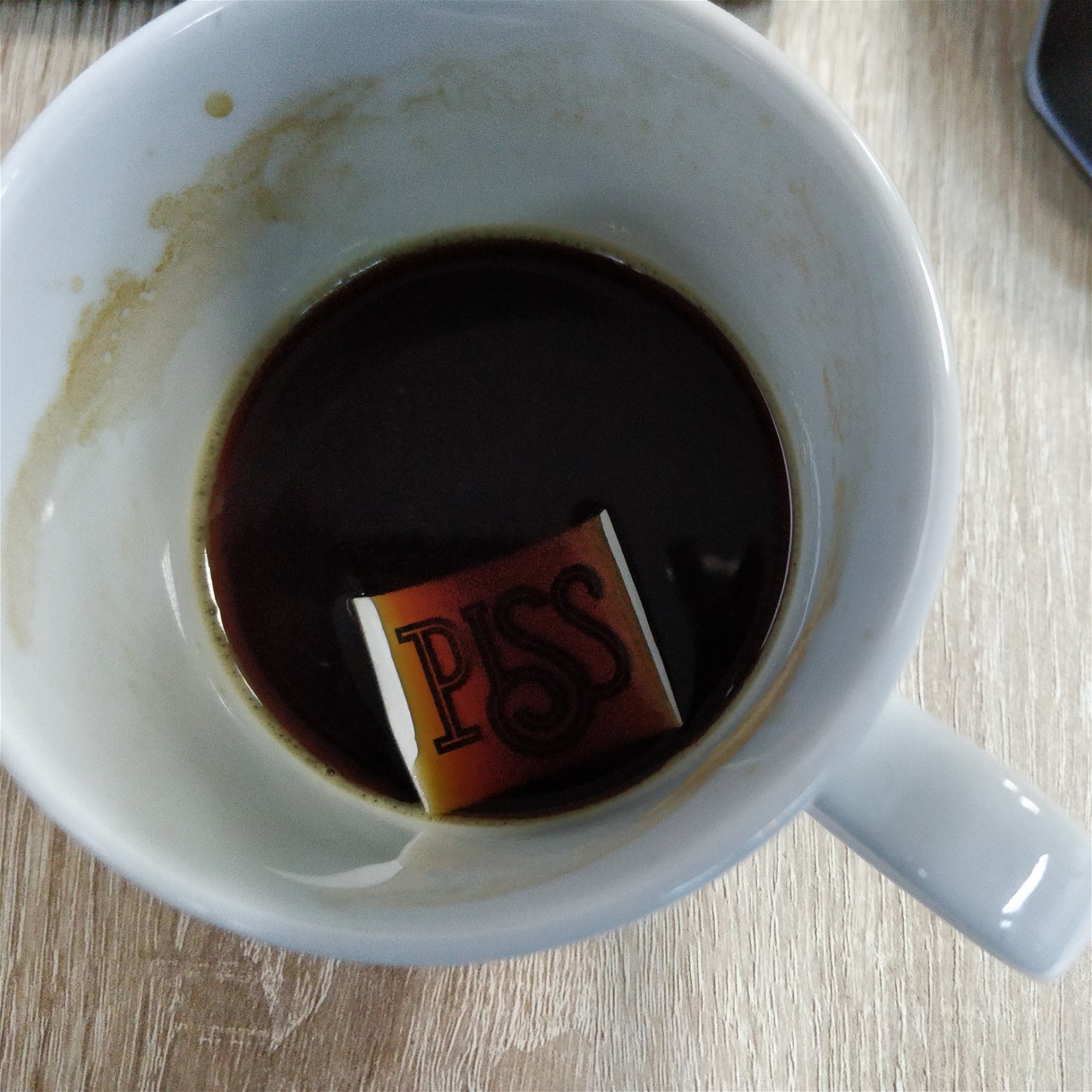 Photo by Tudor Bold with the username @TudorBold,  November 14, 2018 at 5:47 PM and the text says 'Dropped a PISS sticker in my coffee. 
That's all I have to report today'