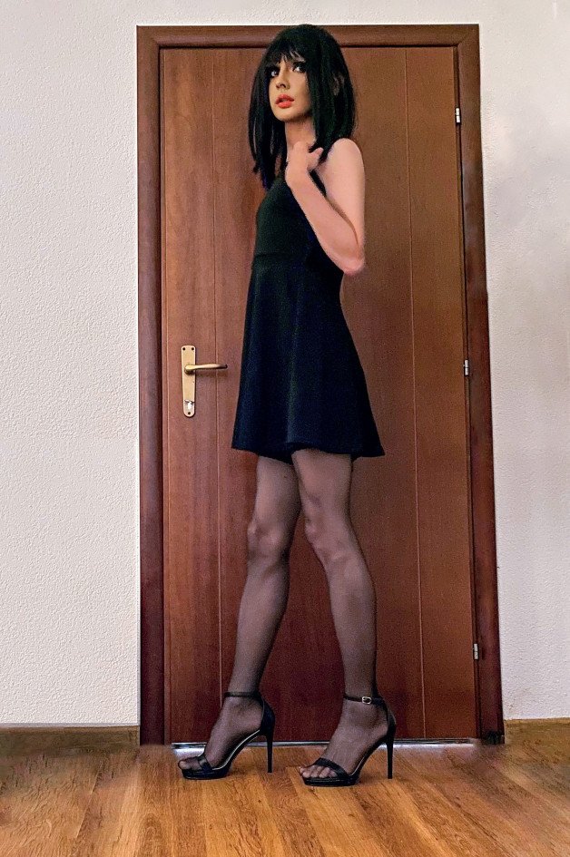 Photo by Anni Litelle with the username @AnniLitelle, who is a star user,  December 19, 2024 at 9:08 PM. The post is about the topic Crossdressers and the text says 'Night in Black. ✨When elegance meets boldness – a short black dress, stiletto heels, and stockings that speak for themselves. How do you like this look?
#LittleBlackDress #Stilettos #Stockings #Elegance #Crossdresser'