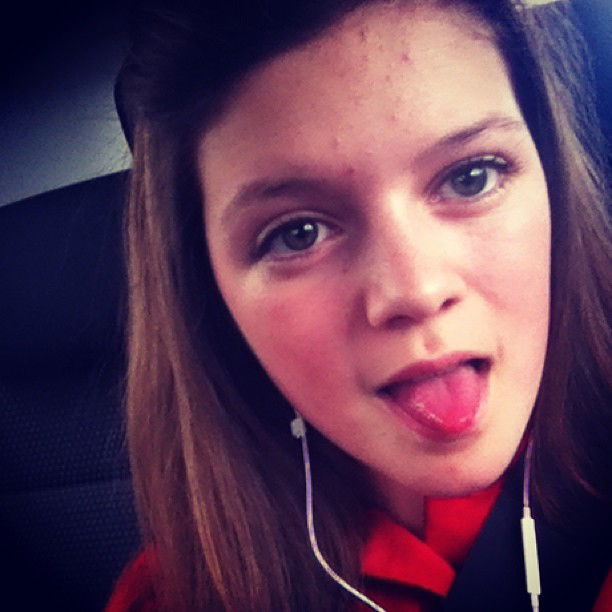 Photo by CassandraD with the username @CassandraD,  April 26, 2013 at 9:25 PM and the text says 'Scala #drama #tongue #hair #brunette #tongue #headphones #carselfie
pheebstiss98, instagram.com'