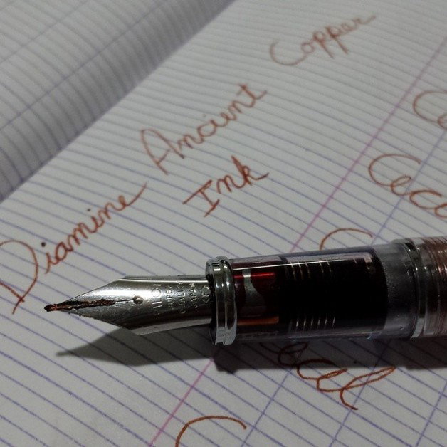 Photo by Jadehawk with the username @Jadehawk,  August 6, 2014 at 4:03 AM and the text says 'Pilot Prera loaded with Diamine Ancient Copper ink.. This particular ink gets thick after a long writing(practice) session you can see it on the nib, but it does not affect flow.'