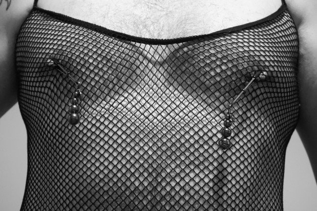 Photo by Spike50Kinky with the username @Spike50Kinky, who is a verified user,  June 12, 2021 at 7:30 AM and the text says 'Here's the nipple clamps

#fishnet #fishnetbodystocking #nipple_clamps #me'