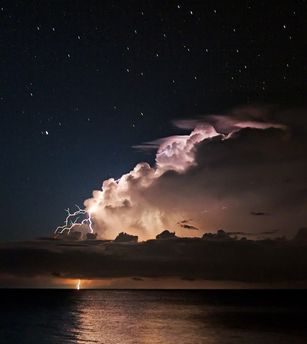 Photo by Kurukafalamabeni with the username @Kurukafalamabeni,  January 28, 2014 at 11:24 AM and the text says 'opticallyaroused:

Lightning-lit cumulonimbus over oceanCaptiva Island, Florida'