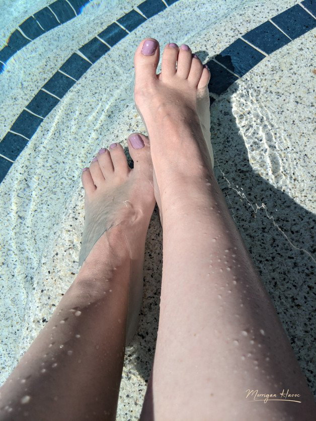 Photo by Morrigan Havoc with the username @LadyMorrigan, who is a star user,  October 2, 2023 at 6:08 PM. The post is about the topic Foot Worship and the text says 'This summer was just too hot for me to enjoy the pool like in the previous years. But I still dipped my toes once or twice in water 💦
I need someone to dry my feet, are you willing to take the job? 👣

#Feet #FootFetish #WetFeet'