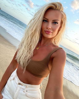 Photo by Devynsdogg with the username @Devynsdogg,  October 1, 2020 at 8:10 PM. The post is about the topic Beach Girls and the text says 'She looks like the poster California beach girl! #blondesarebeautiful #beautifulgirls #sexyfemales #babes #maturewomen #girlsyoudreamof #beautyofthefemaleform'