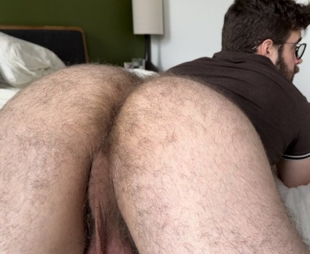 Photo by Nickplus33 with the username @Nickplus33, who is a verified user,  April 18, 2024 at 2:46 AM and the text says '#Forest #otter  #buttspread #hairy #hole #specs #beard #obsession'