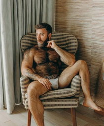 Photo by Nickplus33 with the username @Nickplus33, who is a verified user,  October 15, 2023 at 3:24 AM and the text says '#hairy #beard #dilf #bear #muscled'