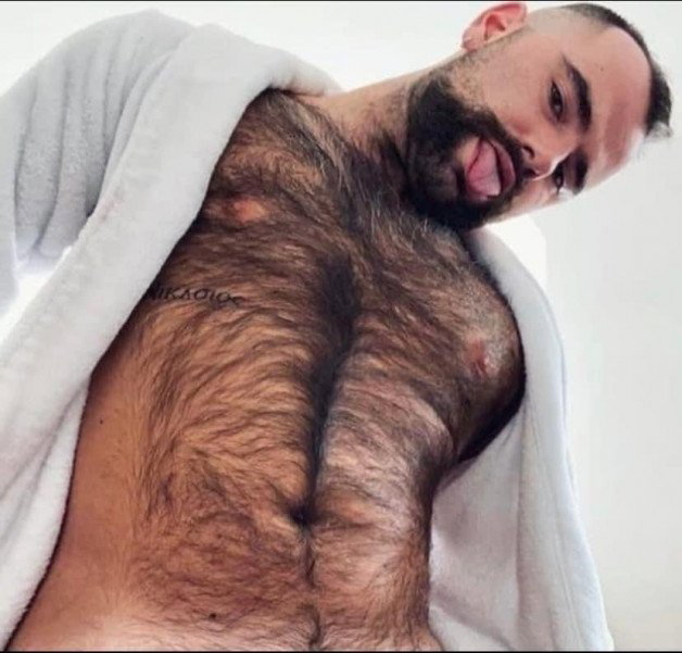 Photo by Nickplus33 with the username @Nickplus33, who is a verified user,  April 25, 2024 at 2:11 AM and the text says '#beard #dilf #tongue #hairy #beefy #youngdilf'