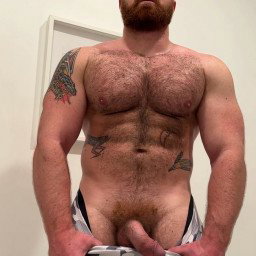 Photo by Nickplus33 with the username @Nickplus33, who is a verified user,  January 4, 2024 at 7:52 AM and the text says '#beefy #beard #chain #bear #hairy #ginger #gingerbush #dilf'