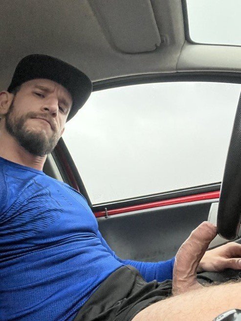 Photo by Nickplus33 with the username @Nickplus33, who is a verified user,  December 18, 2023 at 4:09 AM and the text says '#car #dilf #caps #cruiser #beard #veiny #uncut #hung #thickdick'