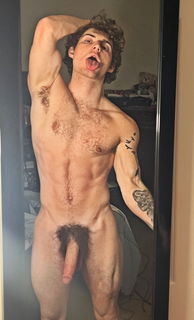 Photo by Nickplus33 with the username @Nickplus33, who is a verified user,  July 13, 2024 at 2:15 AM and the text says '#toned #tongue #hairy #thickbush #ink #longdick #schlong  #hung #massivecock'