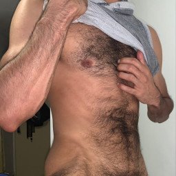 Photo by Nickplus33 with the username @Nickplus33, who is a verified user,  April 28, 2024 at 2:48 AM and the text says '#beard #hairy #youngdilf #thickbush #bush #toned #hairychest'